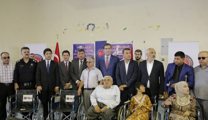 TİKA'dan, Erbil'de 156 engelliye tekerlekli sandalye yardımı